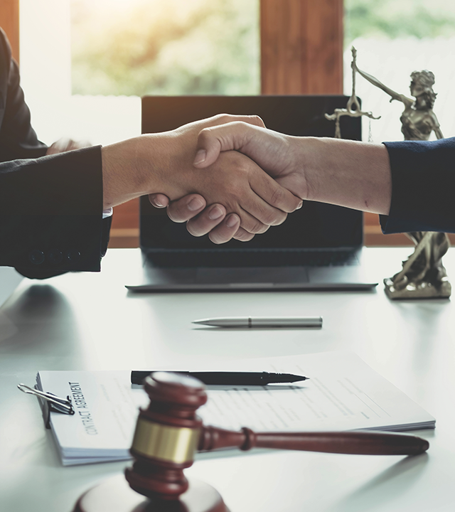 businessman-shaking-hands-to-seal-a-deal-with-his-2023-11-27-05-34-32-utc businessman-shaking-hands-to-seal-a-deal-with-his-2023-11-27-05-34-32-utc